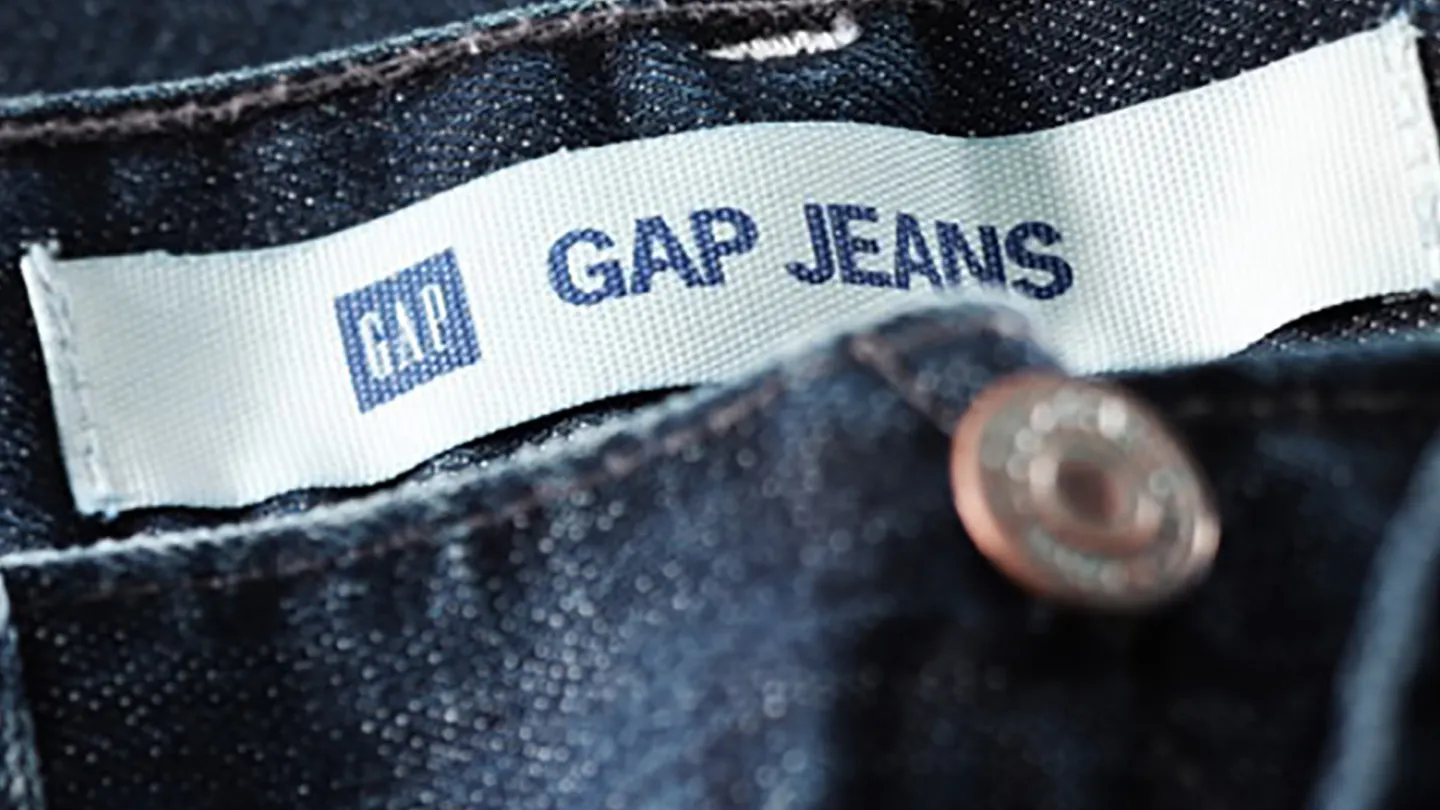 Close up photo of jeans showing the GAP logo
